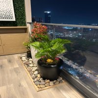 Luxury Balcony with Wooden Flooring & Custom Backdrop